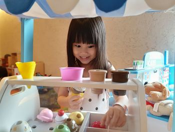 Portrait of smiling girl at home