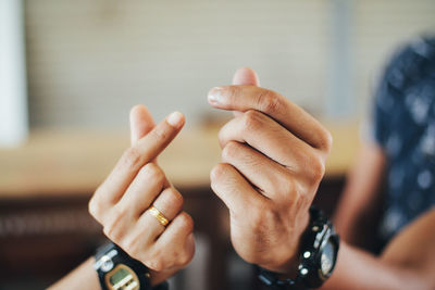 Close-up of woman hand with text