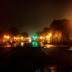Illuminated street light at night