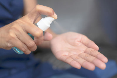 Close-up of woman holding hands