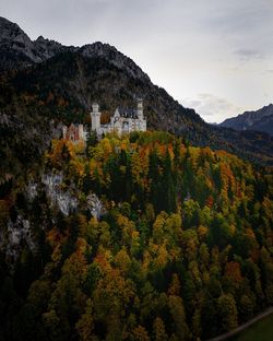 High angle view of trees and mountains against sky