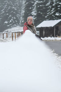 Portrait of woman covered with snow