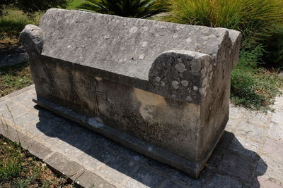 High angle view of stone wall at cemetery