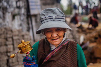 Portrait of woman wearing hat