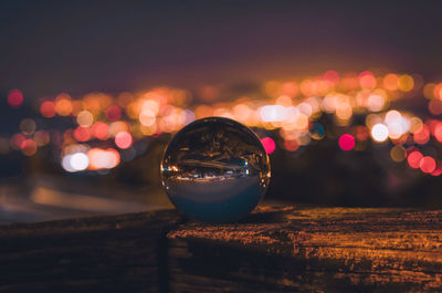 Close-up of illuminated lights on table