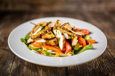 Close-up of food served in plate on table