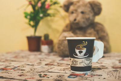 Close-up of coffee cup on table