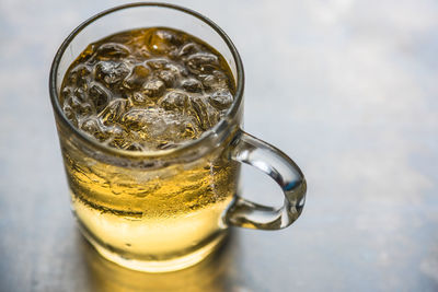 High angle view of beer in glass on table