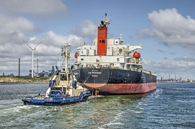 Nautical vessel on sea against sky