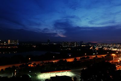 Illuminated cityscape at night