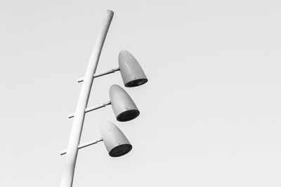 Close-up of lamp over white background