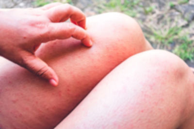 Close-up of baby lying on hand