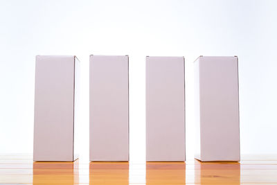 Close-up of open book against white background