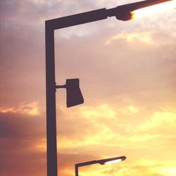 Low angle view of cloudy sky at sunset