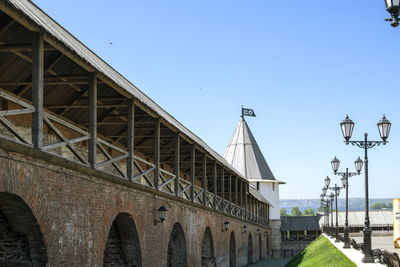 Kazan, russia - may 19, 2021 perspective fragment of fortress defensive wall of  kazan kremlin