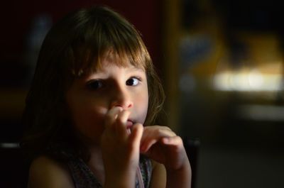 Close-up portrait of cute girl