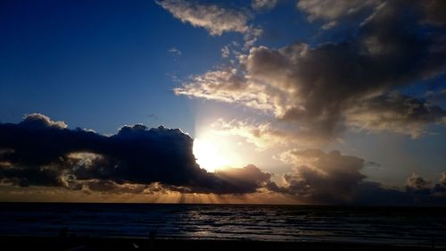 Scenic view of sea at sunset
