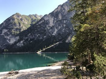 Scenic view of lake and mountains against sky