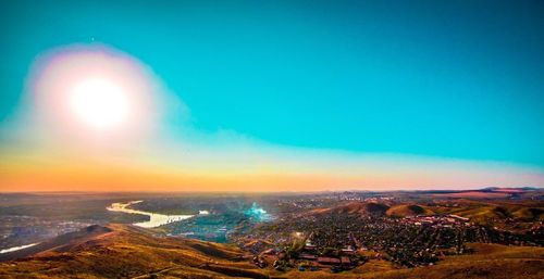 Aerial view of cityscape at sunset