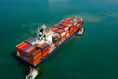 Logistics and transportation of international container cargo ship in the ocean freight aerial view