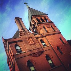 Low angle view of building against blue sky