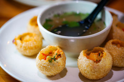 Close-up of served food in plate