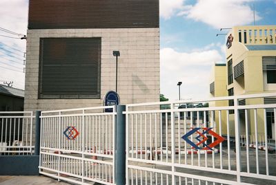 Railing against building in city