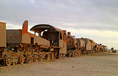 Panoramic view of old train against sky