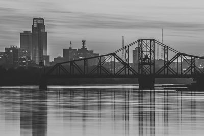 View of bridge and buildings against sky