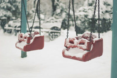 Close-up of swing during winter