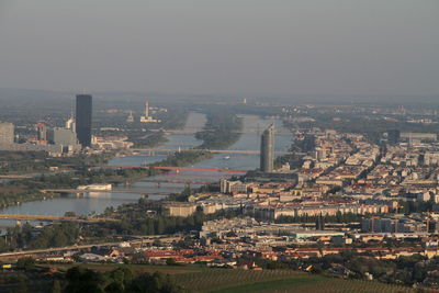 High angle view of illuminated buildings in city against sky