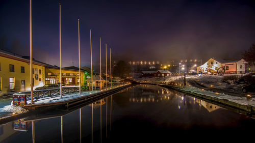 Boats moored at harbor