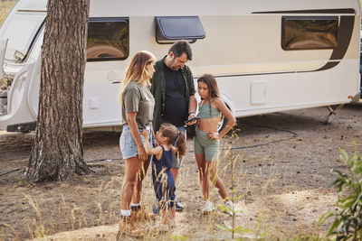 Family at camping site
