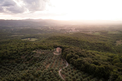 Scenic view of landscape against sky during sunset