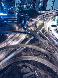 High angle view of light trails on highway at night