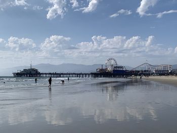 Pier on sea against sky