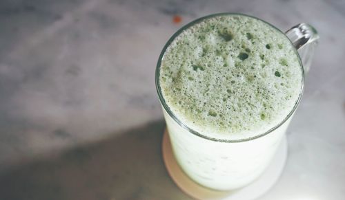 High angle view of drink in glass on table