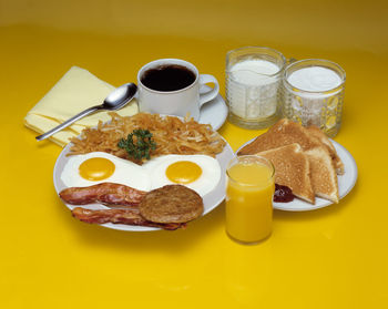 Close-up of breakfast served on table