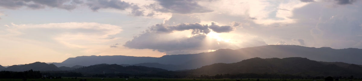 Panoramic view of landscape against sky during sunset