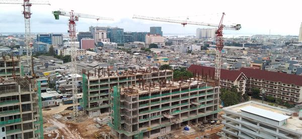 High angle view of buildings against sky in city