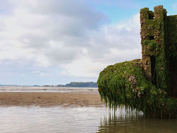 Scenic view of tenby from amroth beech against sky