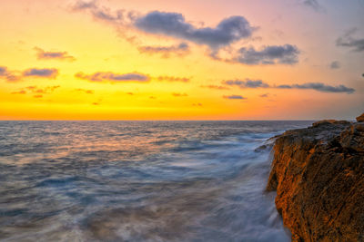 Scenic view of sea against sky during sunset in malta