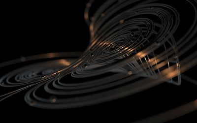 Close-up of piano keys against black background