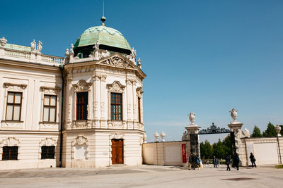 Exterior of historic building against clear blue sky