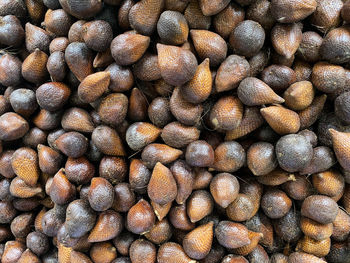 Arrangement of salak fruit in a box ready to be sold