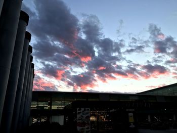 Low angle view of silhouette buildings against sky during sunset