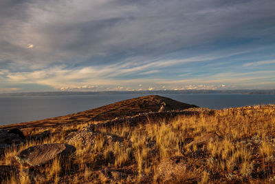 Scenic view of landscape against sky during sunset