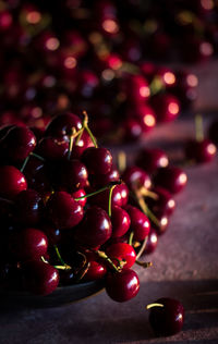 Close-up of cherries on table