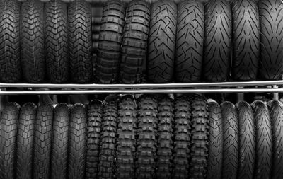 Full frame shot of tires on rack at store