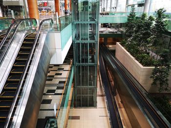 High angle view of escalator by buildings